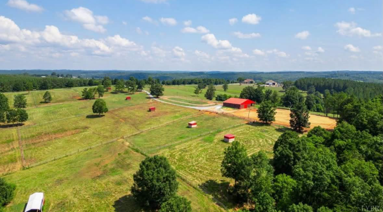 Rolling fenced pastures at Threefold Stables